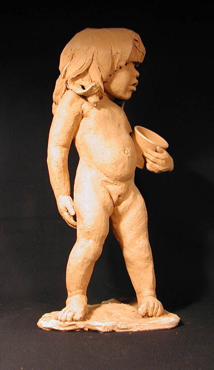 child_with_pail_front.jpg (49855 bytes)